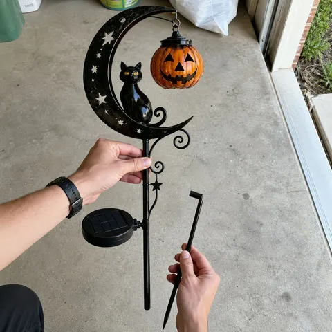 Customer-style photo of single lantern light being assembled