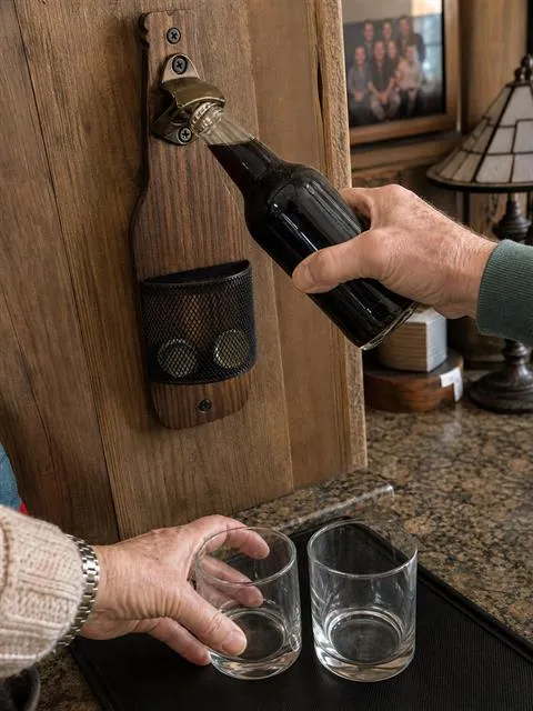 Casual customer-style home-bar snapshot of the wall-mounted opener