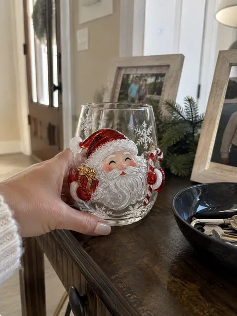 Santa glass displayed on an entryway console in a family home