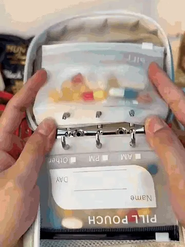 Opening the compact organizer and flipping through removable pouches