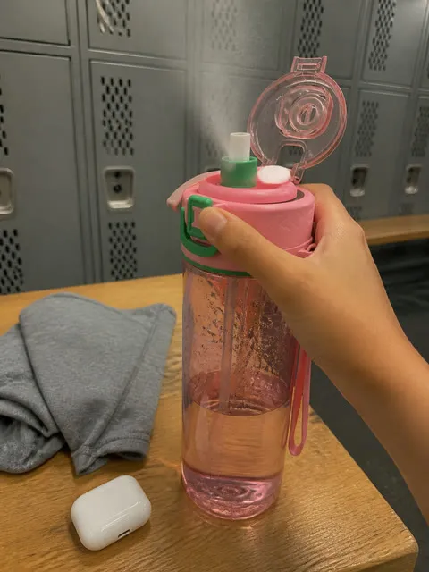 Misting bottle used in a gym locker room
