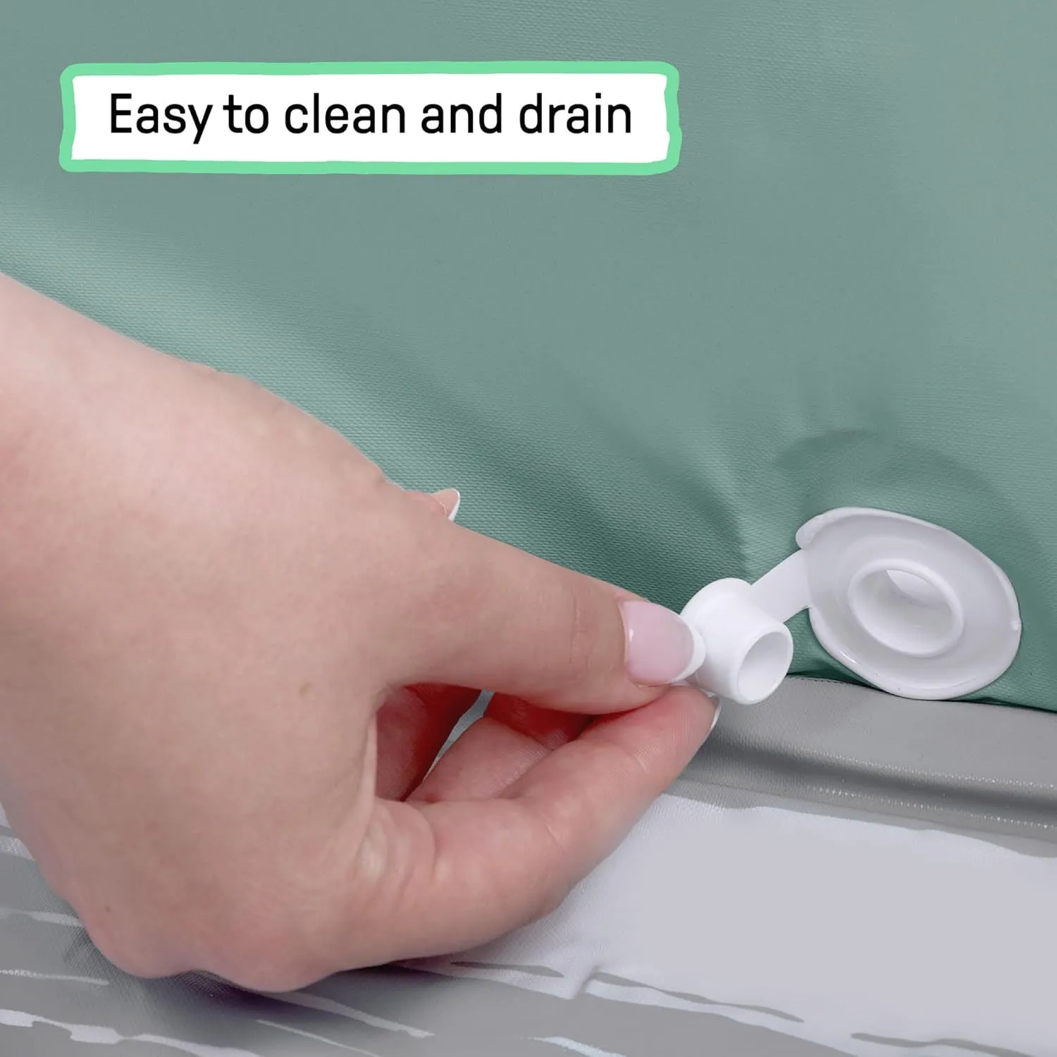 Close view of the easy-drain plug inside the mint basin