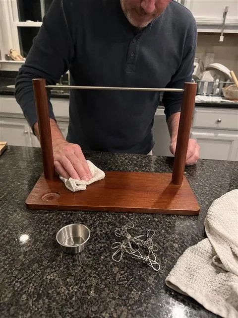 Wiping the wooden serving board