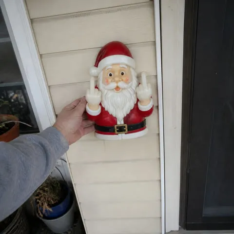 Customer-style photo of installing the Santa light