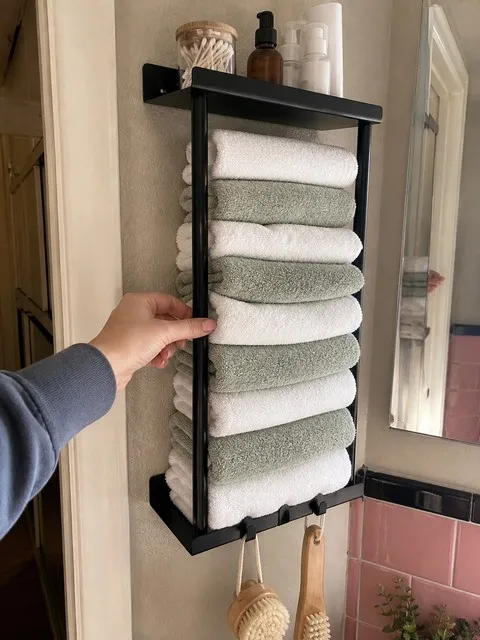 Organized towels within easy reach in a family bathroom
