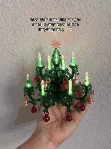 Christmas tree night light changing colors and plugging into a wall outlet
