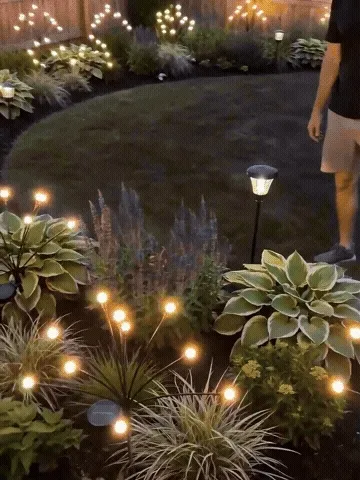Solar garden lights glowing from day into night
