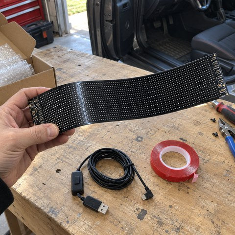 Flexible LED matrix and mounting accessories on a garage workbench
