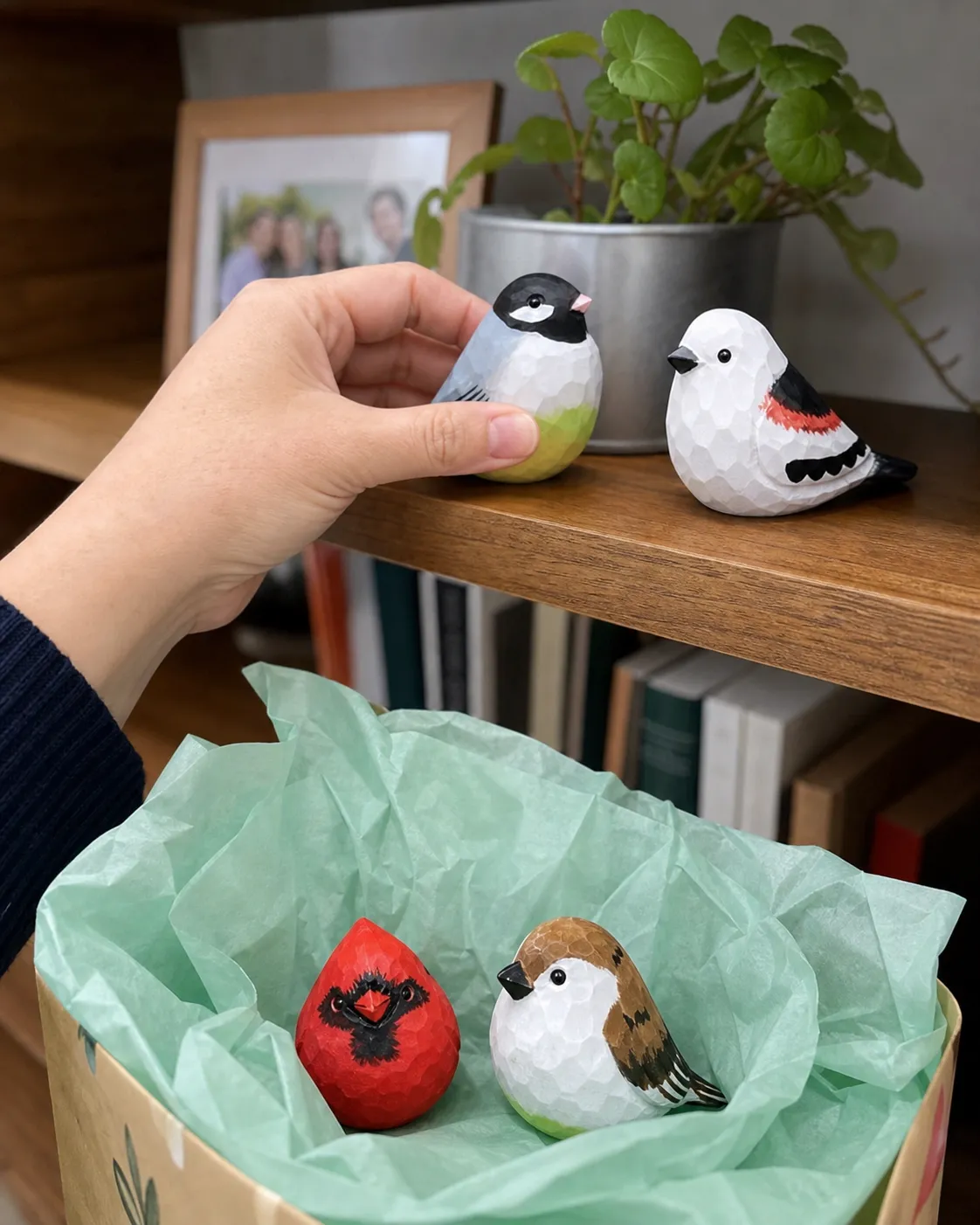 Painted wooden birds prepared as handmade gifts