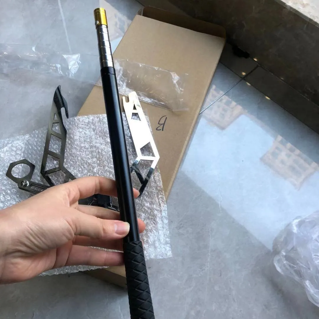 Boat owner with a stainless steel mooring hook at the dock