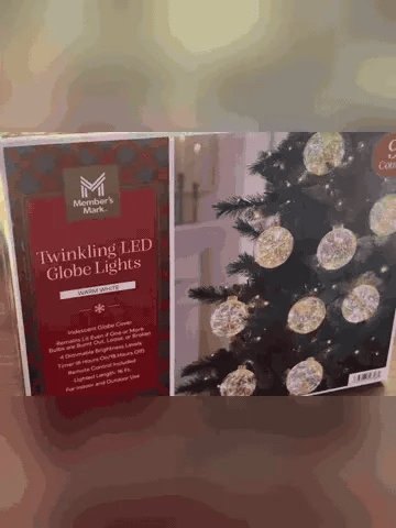 Crackle globe lights glowing in a colorful holiday display