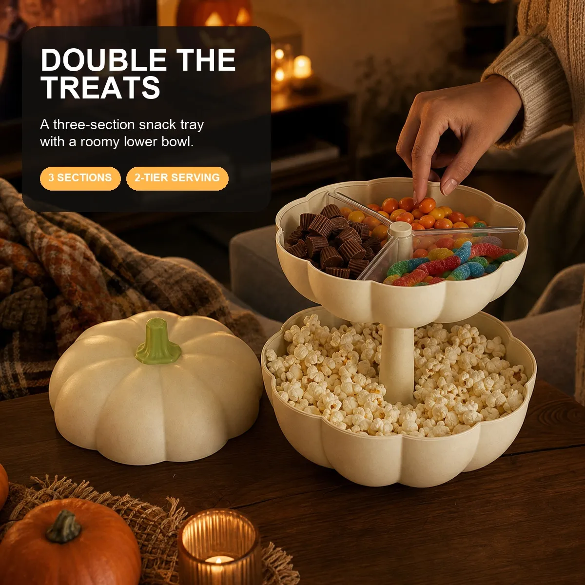 Cream pumpkin snack server with three divided sections and lower popcorn bowl