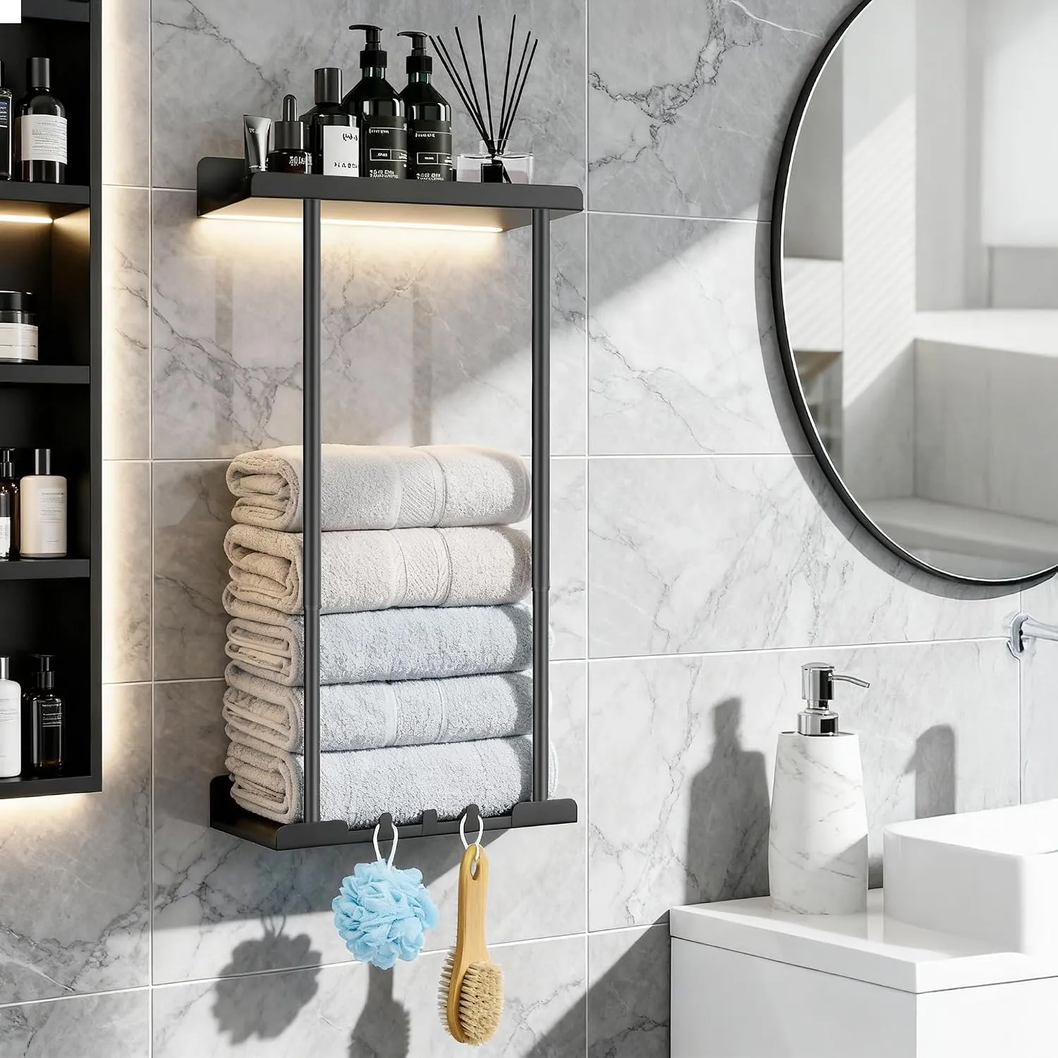 Black wall-mounted rack organizing towels and bath accessories