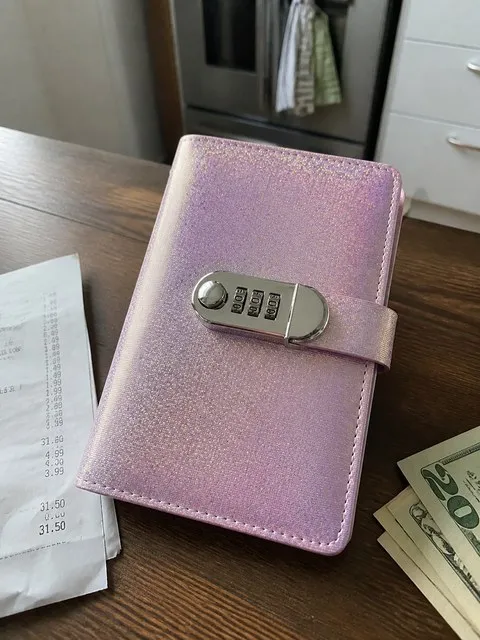 Purple savings binder on a kitchen table