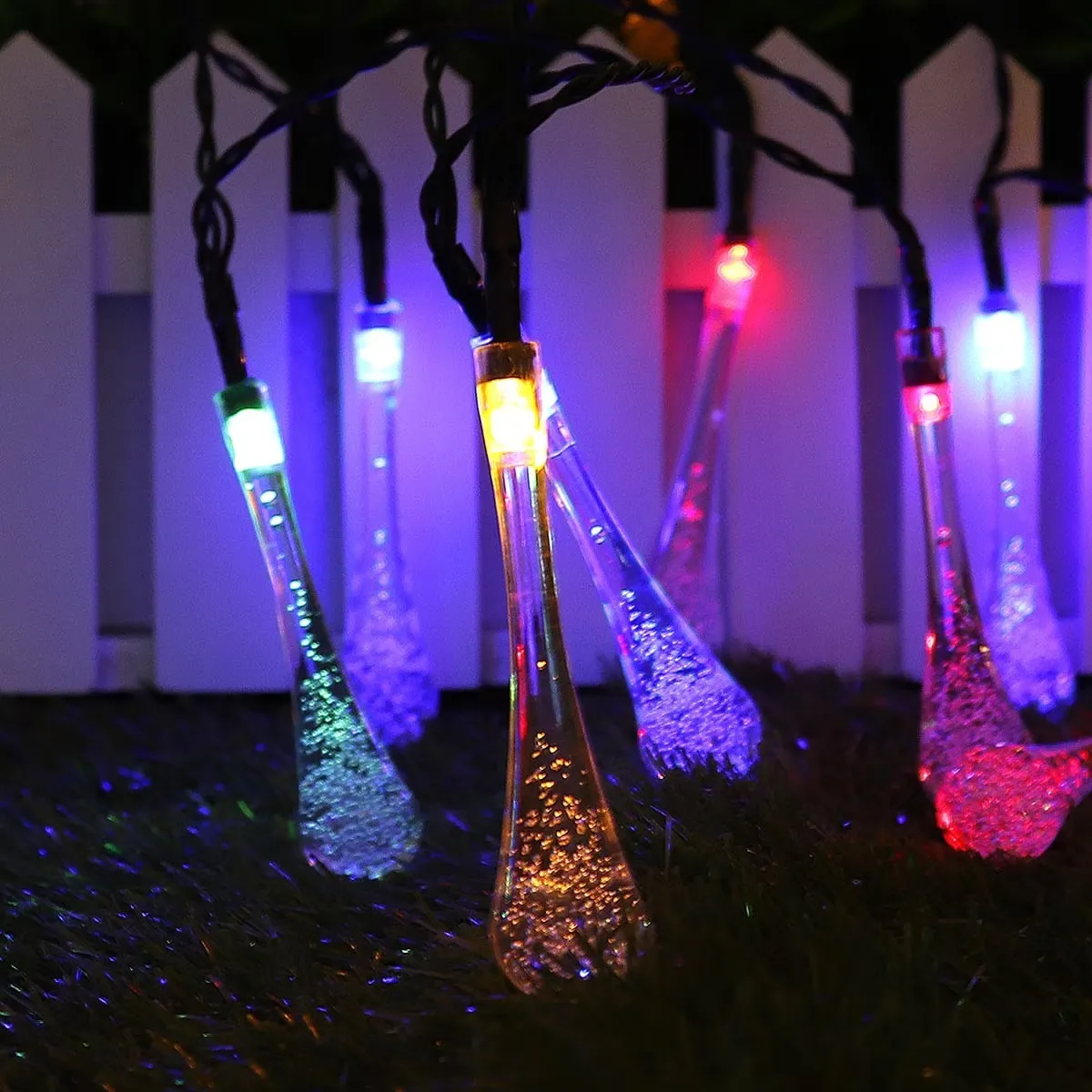 Close view of clear bubble-textured multicolor waterdrop bulbs