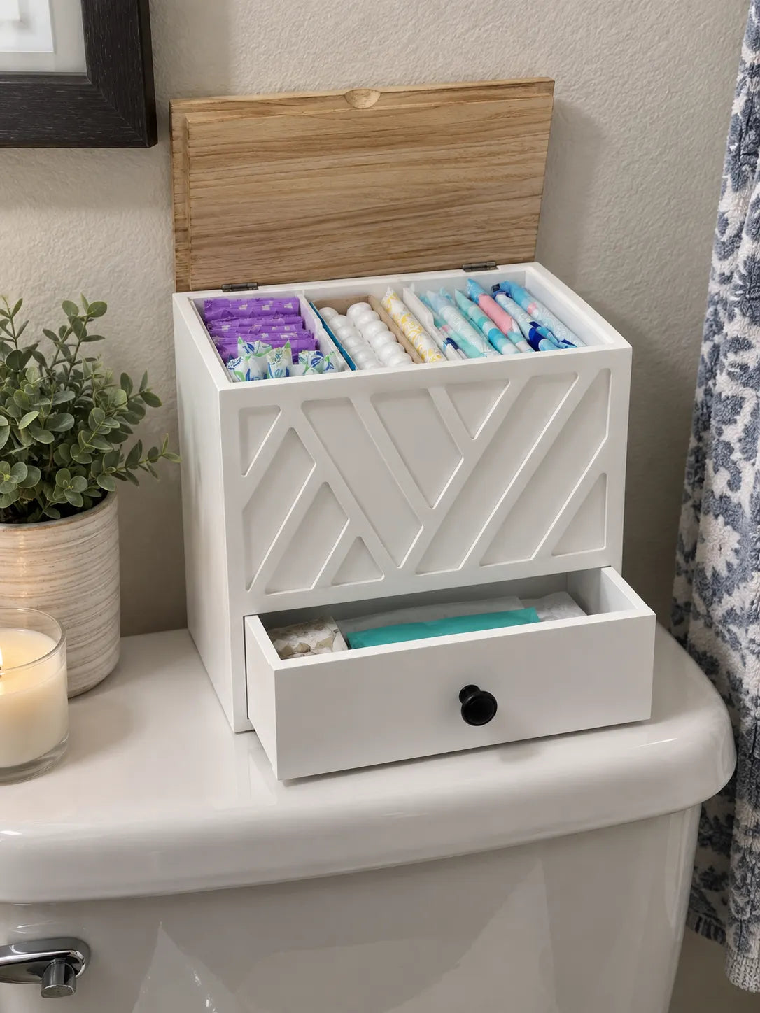 Organizer filled on a guest bathroom toilet tank