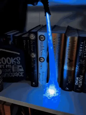 Dragon flame bookshelf decoration glowing in red and blue