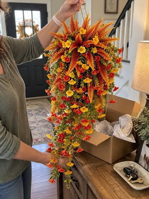 Autumn floral swag being unpacked in a home entryway