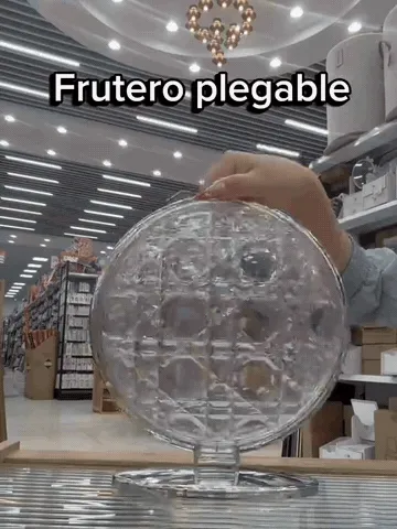 Foldable serving stand opening from a compact round form into three trays