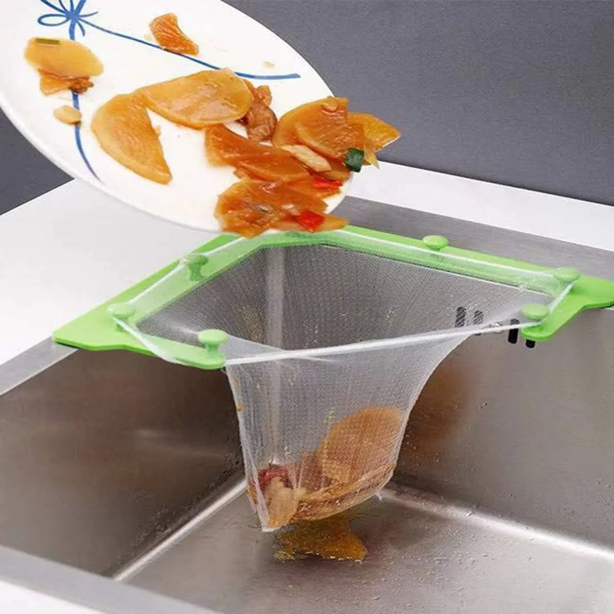Food scraps draining into the sink strainer bag