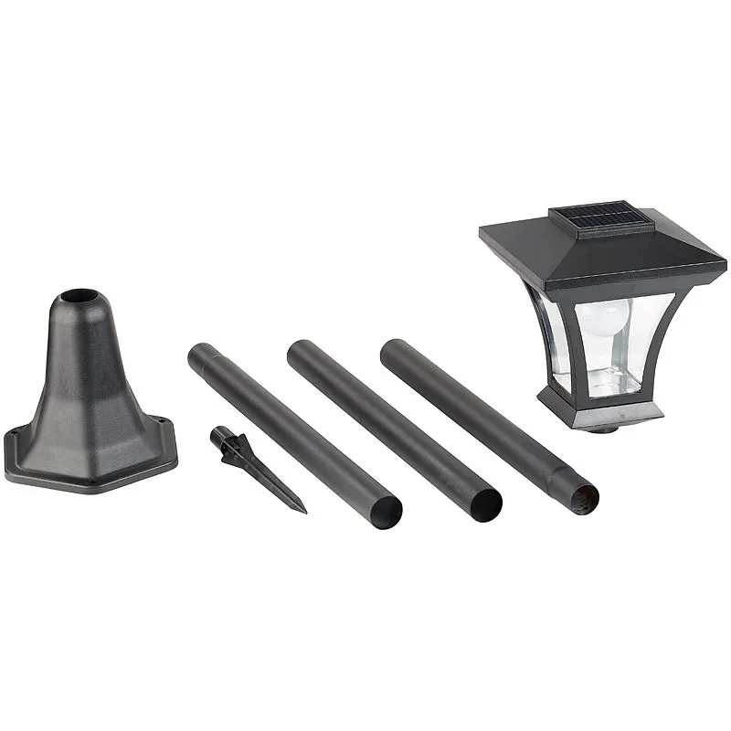 Lantern head, pole sections, base, and ground stake components