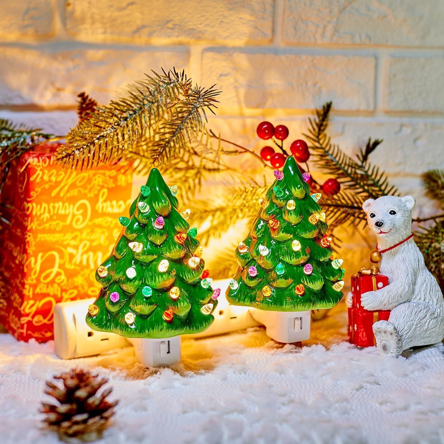 Green Christmas tree night lights displayed with holiday decorations