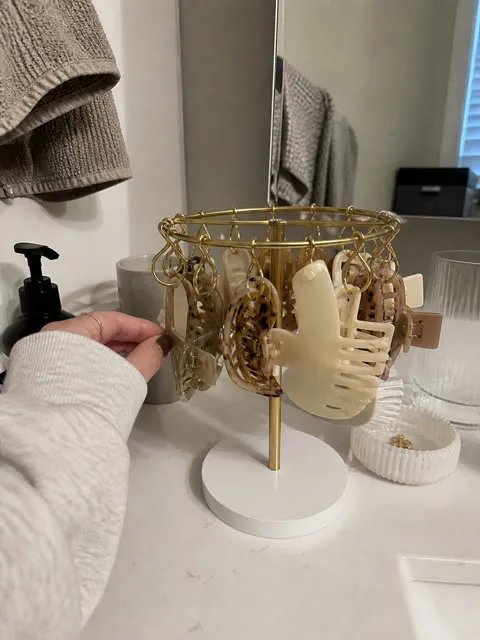 Claw clip organizer on a small bathroom vanity