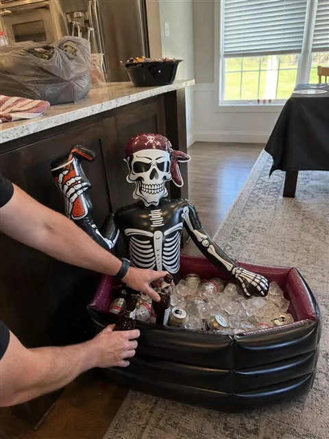Pirate skeleton cooler being filled in a home kitchen