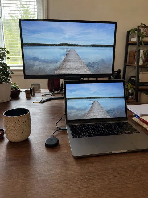 Laptop sharing a presentation to a desktop monitor
