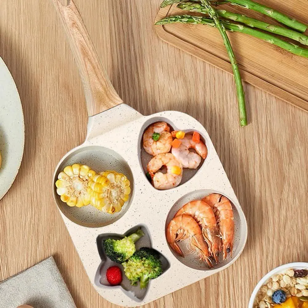 Four-compartment pan with a colorful meal
