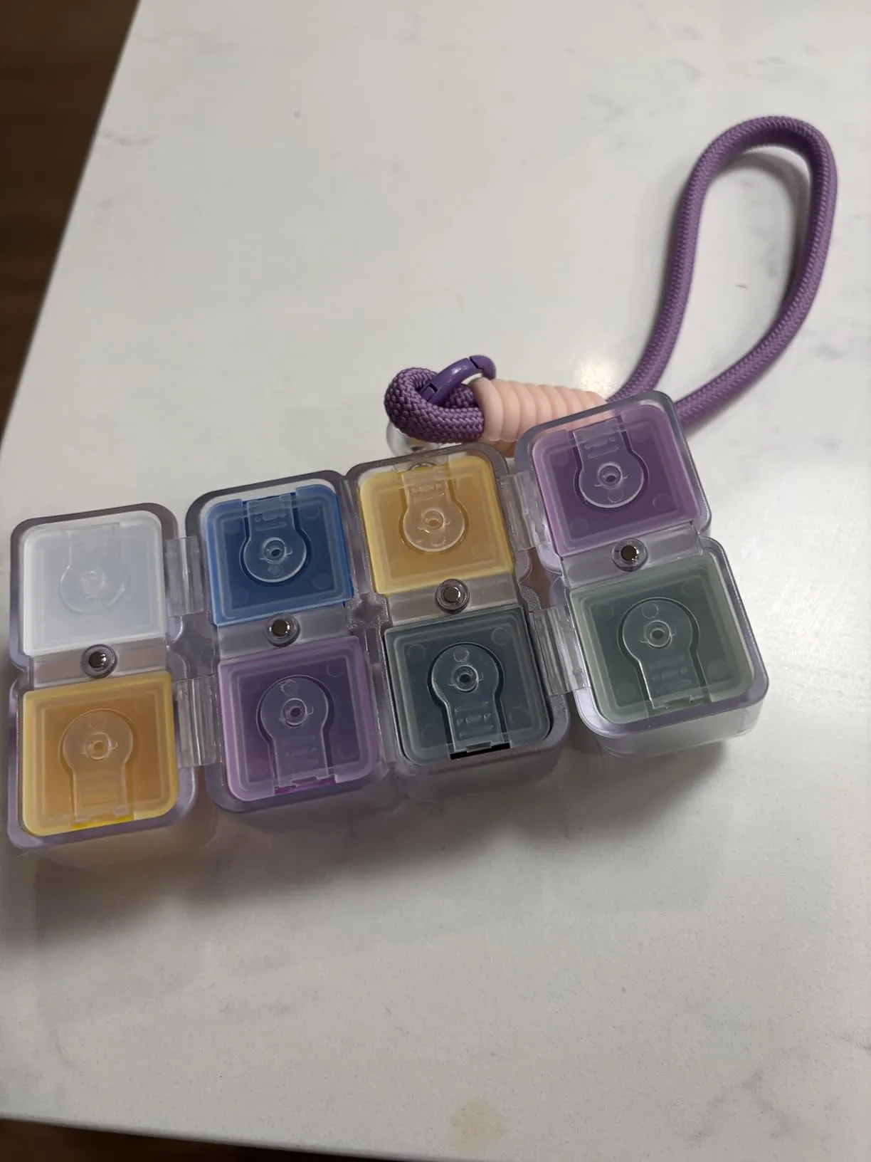 Convenient, cute and easy to use pill box on a key chain