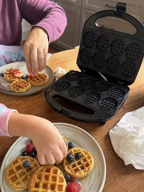 Family serving mini waffles at a weekend breakfast table