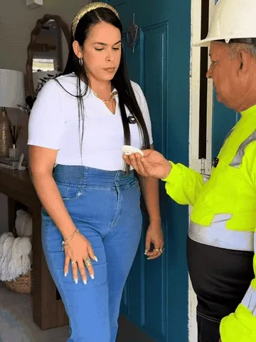 Two people using the wearable translator during a face-to-face conversation