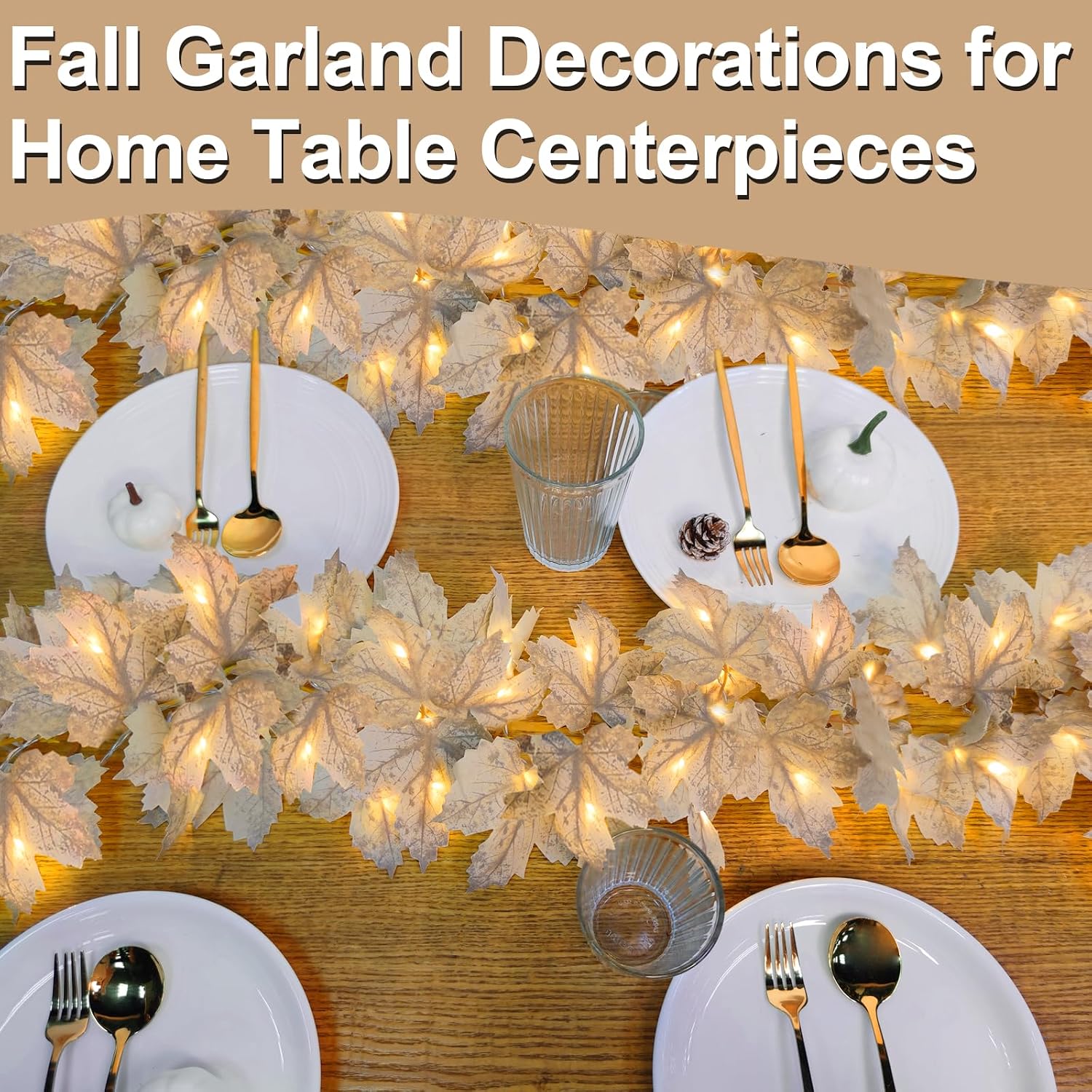 Ivory lighted maple leaf garland styled as a fall table centerpiece