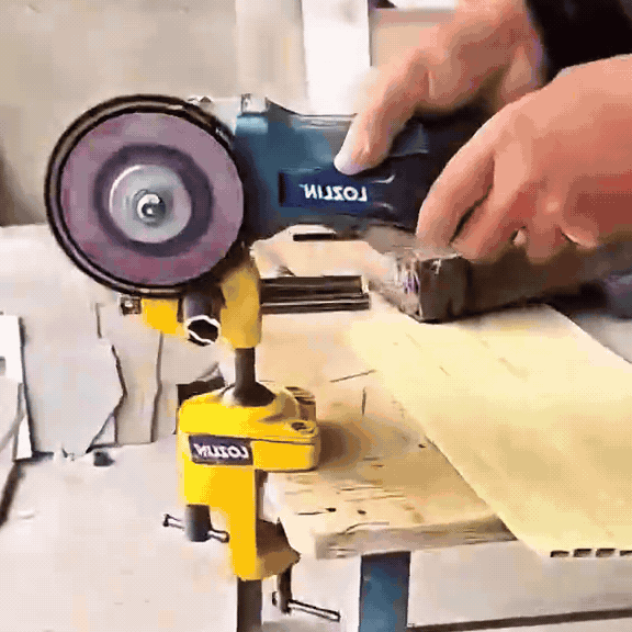 Looping demonstration of a guarded cutting disc working through several workshop materials