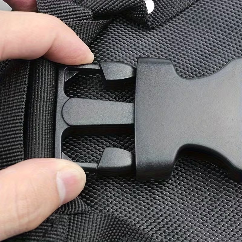 Close-up of the black quick-release buckle and woven webbing