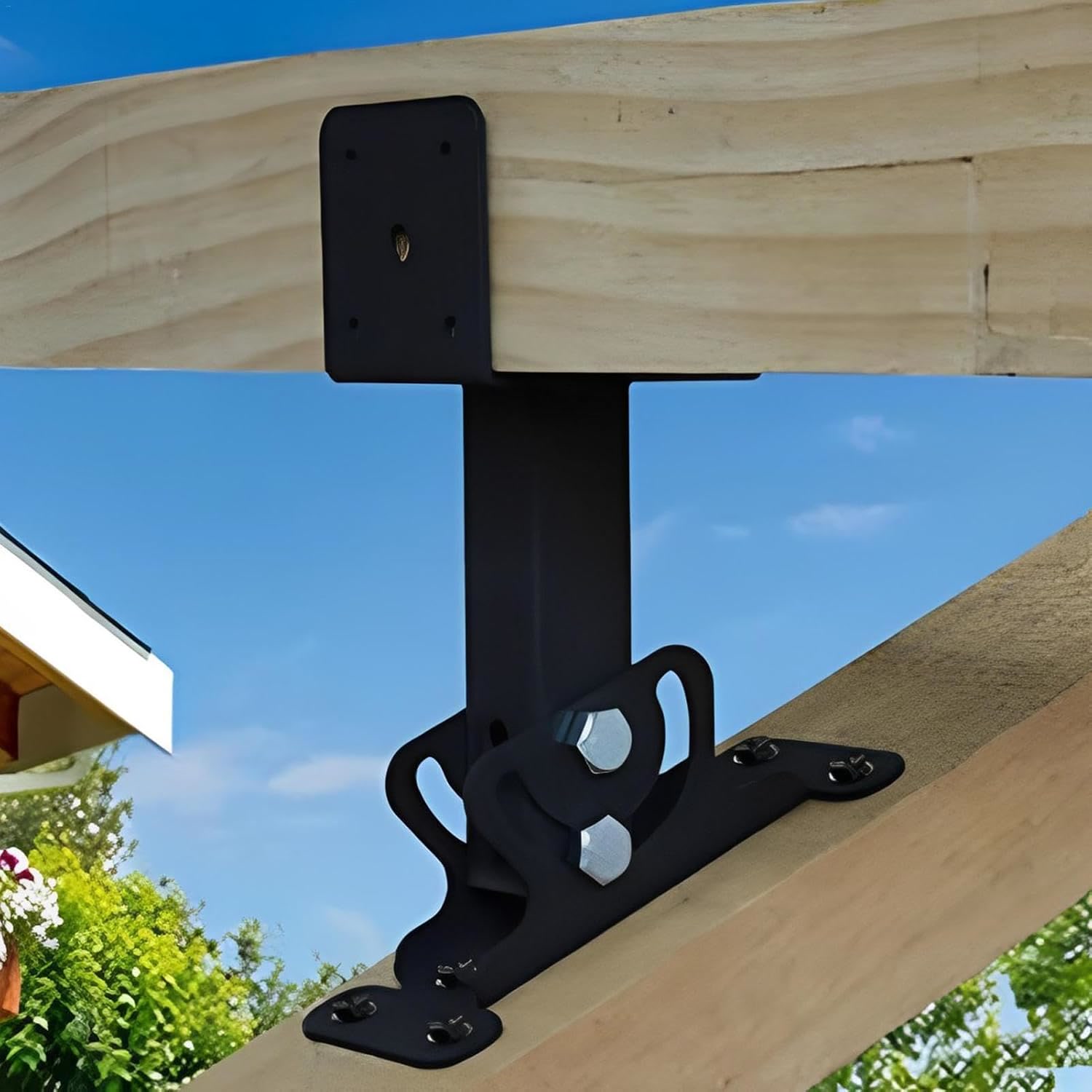 Close view of a black adjustable bracket under a wood patio beam