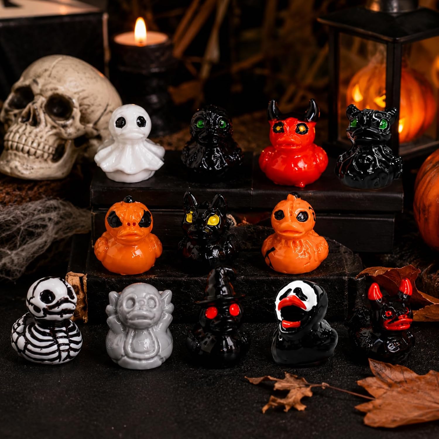 Assorted Halloween duck characters with candlelit decor