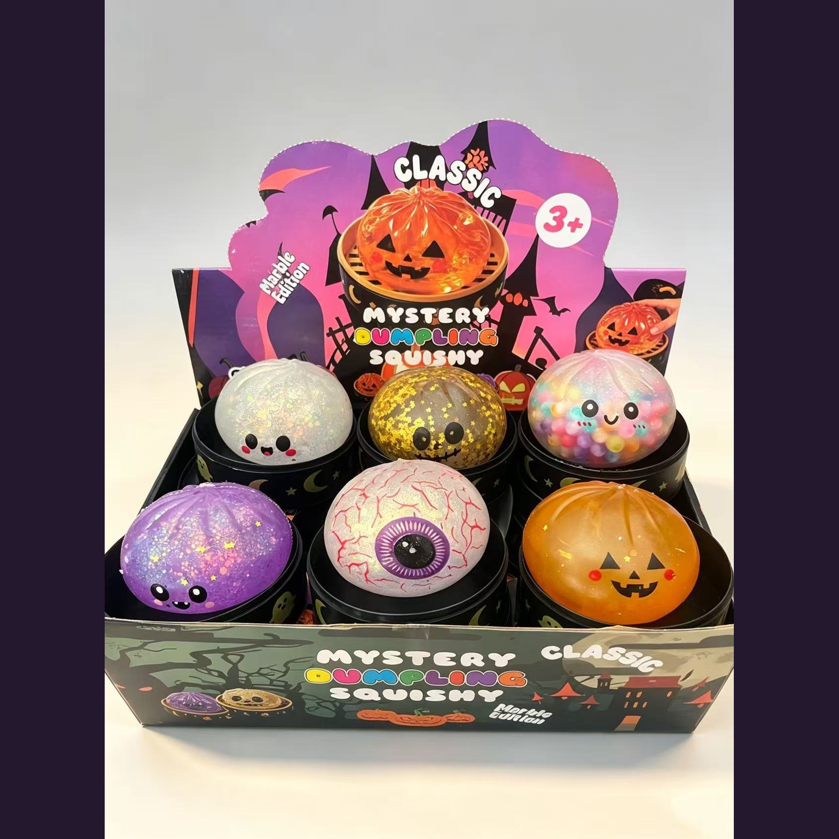 Six Halloween squishy dumpling designs in one assortment