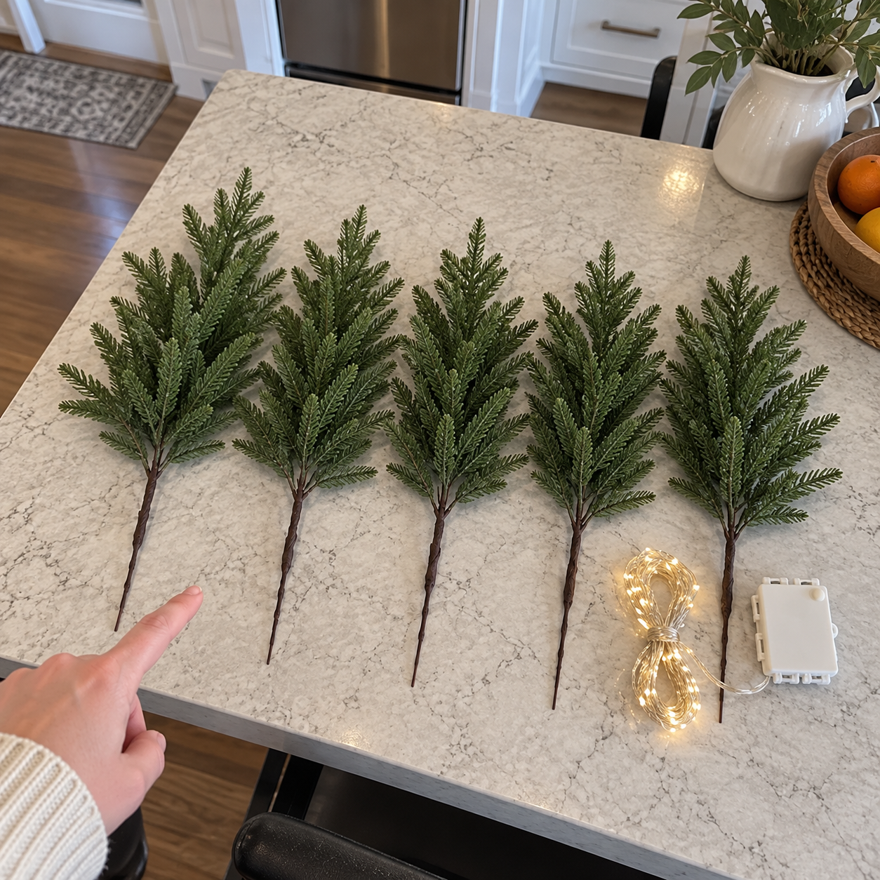 Five separate pine stems, one warm-white light string, and one white control box