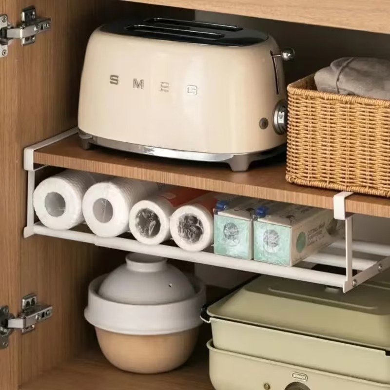 One white rack under a cabinet shelf