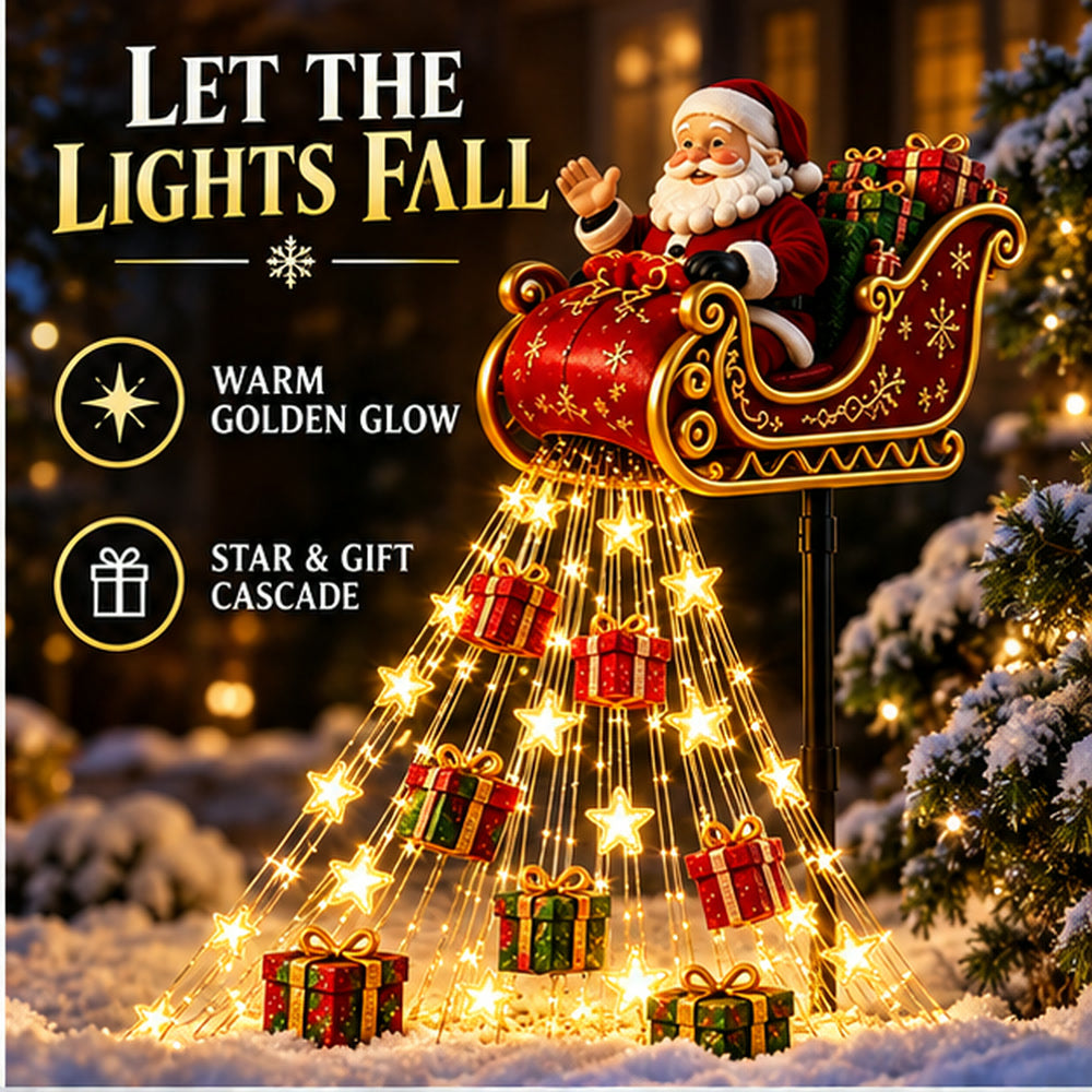 Close view of the red-and-gold Santa sleigh above the glowing cascade