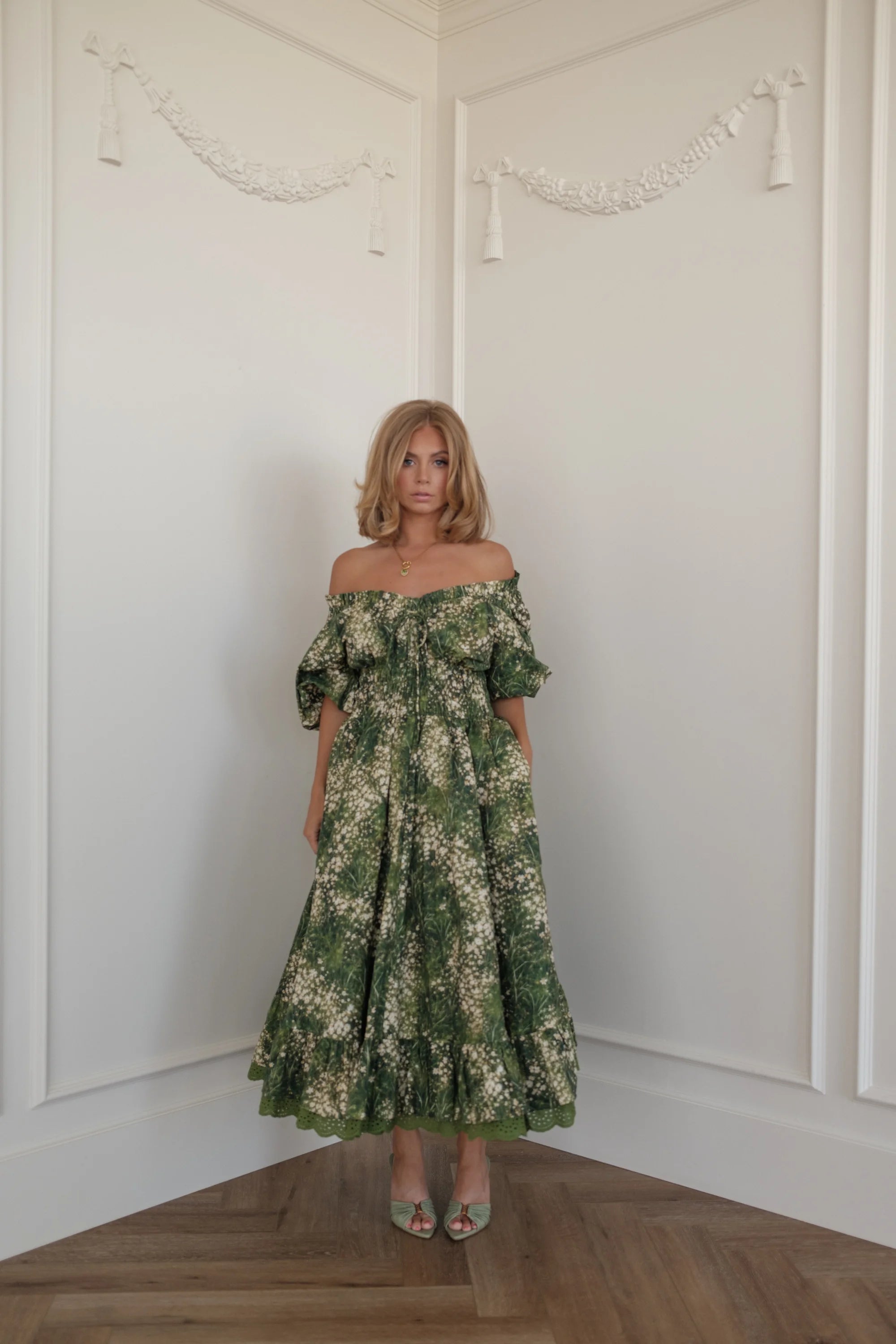 Jessa wearing the Cerise Dress in green floral