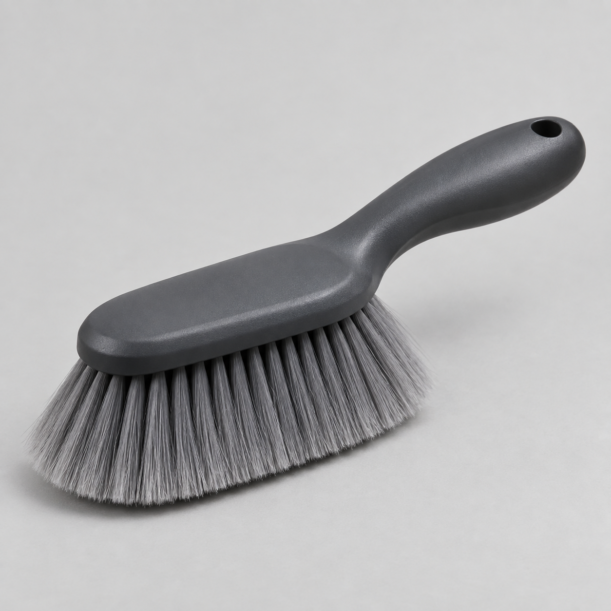 Dashboard Dust Brush in a clean studio setting without logos