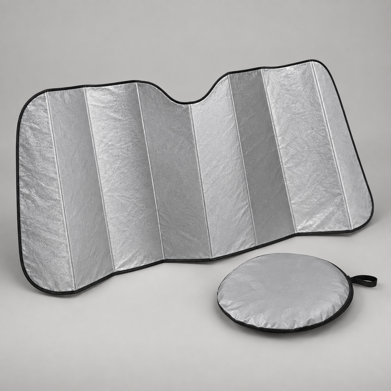 Folding Windshield Sunshade in a clean studio setting without logos