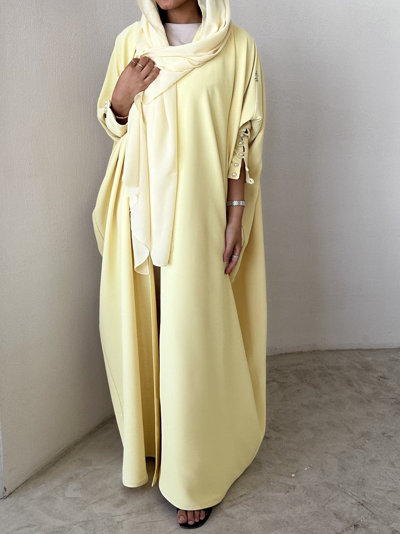 Butter Yellow crepe abaya, bisht style with Pearl Buttons