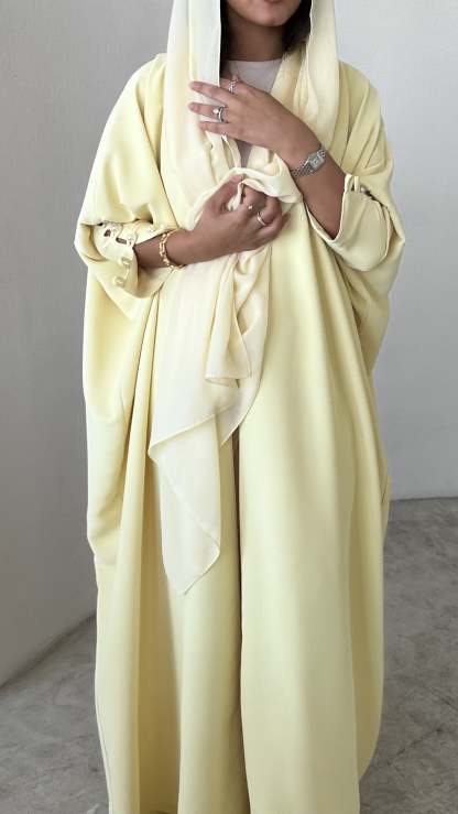 Butter Yellow crepe abaya, bisht style with Pearl Buttons