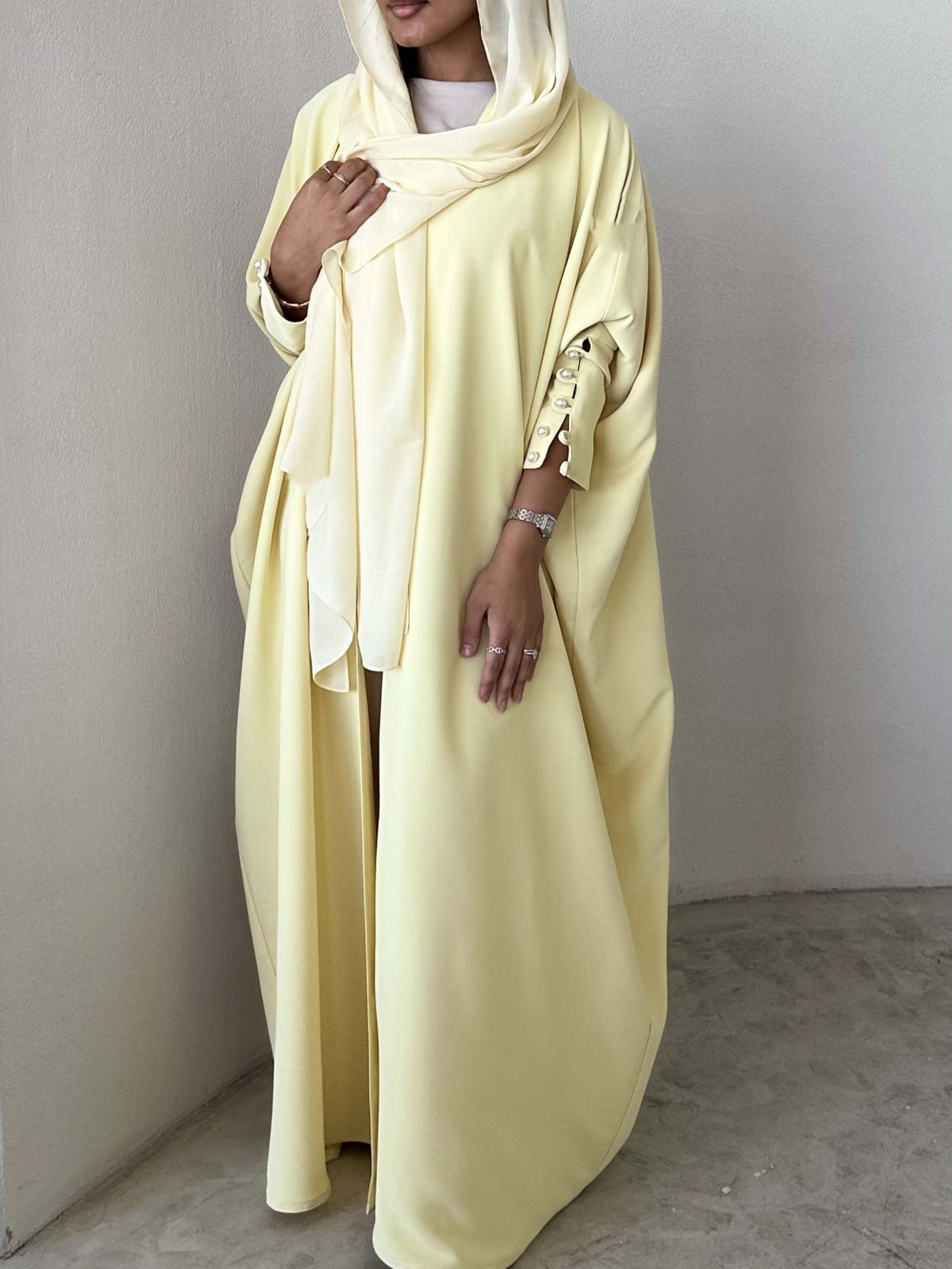 Butter Yellow crepe abaya, bisht style with Pearl Buttons