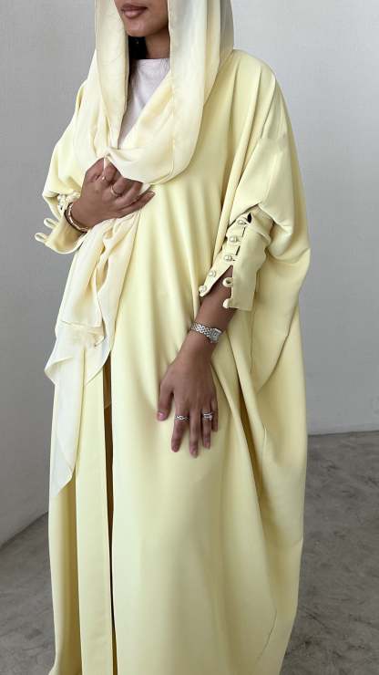 Butter Yellow crepe abaya, bisht style with Pearl Buttons