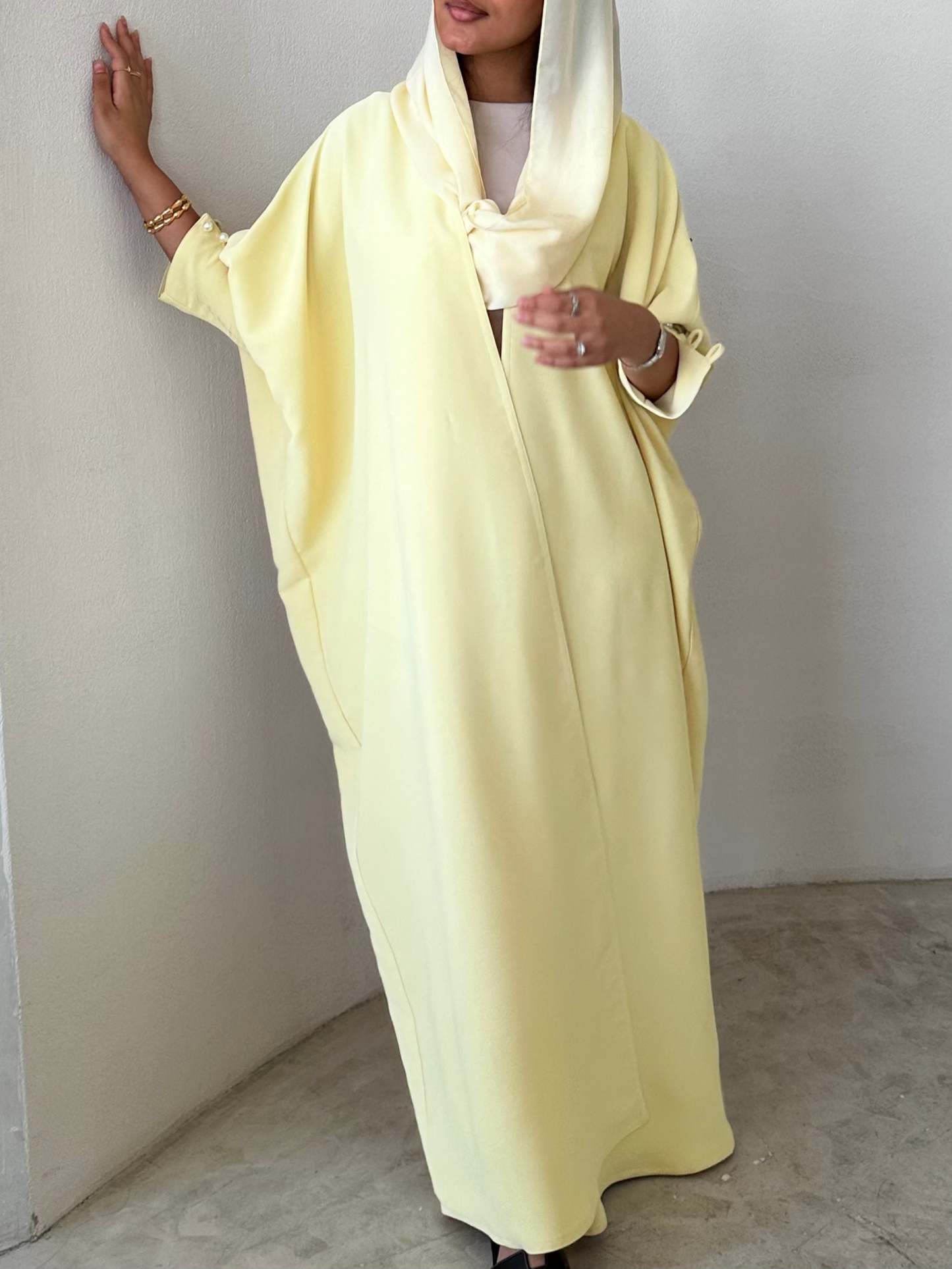 Butter Yellow crepe abaya, bisht style with Pearl Buttons